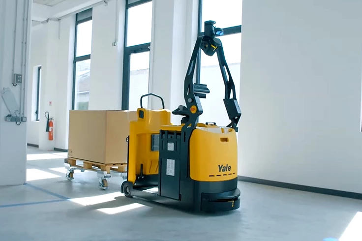 Yale robotic tow tractor towing a cart