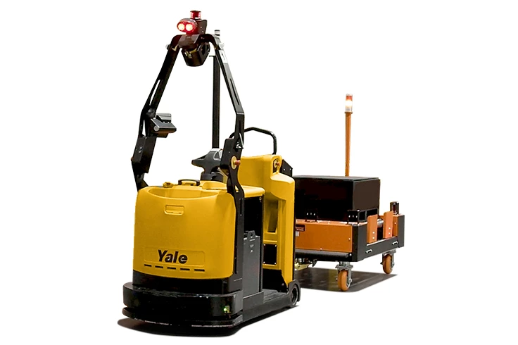 Yale automated tow tractor towing a cart