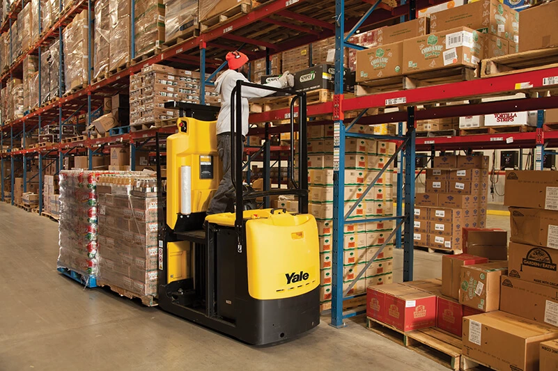 Order picker foot controlled lifting platform allows operators to focus on making picks by Yale